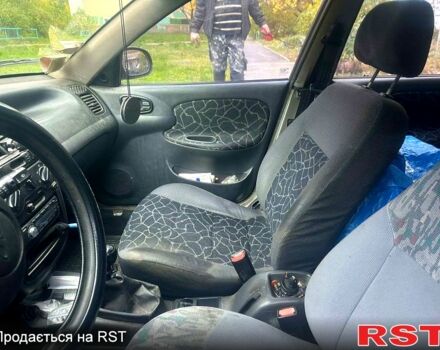 Сірий Деу Ланос, об'ємом двигуна 1.5 л та пробігом 238 тис. км за 2200 $, фото 4 на Automoto.ua