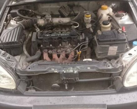 Серый Дэу Ланос, объемом двигателя 1.5 л и пробегом 207 тыс. км за 2000 $, фото 5 на Automoto.ua