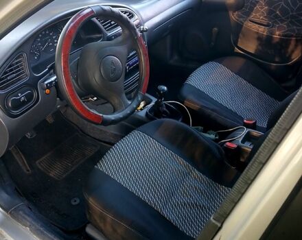 Сірий Деу Ланос, об'ємом двигуна 1.5 л та пробігом 236 тис. км за 1800 $, фото 3 на Automoto.ua