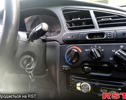 Серый Дэу Ланос, объемом двигателя 1.6 л и пробегом 300 тыс. км за 1700 $, фото 1 на Automoto.ua