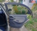 Сірий Деу Ланос, об'ємом двигуна 1.5 л та пробігом 100 тис. км за 1300 $, фото 1 на Automoto.ua