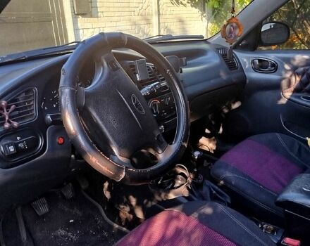 Серый Дэу Ланос, объемом двигателя 1.5 л и пробегом 260 тыс. км за 2400 $, фото 8 на Automoto.ua