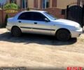 Сірий Деу Ланос, об'ємом двигуна 1.5 л та пробігом 230 тис. км за 1150 $, фото 1 на Automoto.ua