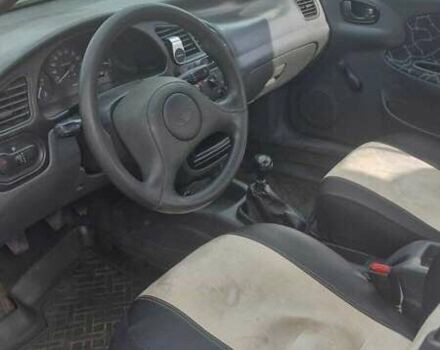 Серый Дэу Ланос, объемом двигателя 1.5 л и пробегом 220 тыс. км за 2200 $, фото 5 на Automoto.ua