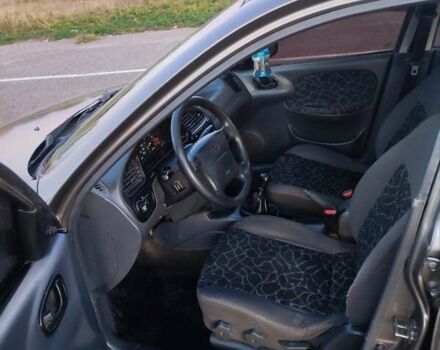 Сірий Деу Ланос, об'ємом двигуна 1.6 л та пробігом 234 тис. км за 2400 $, фото 14 на Automoto.ua