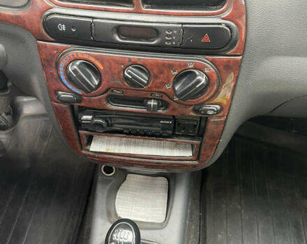 Серый Дэу Ланос, объемом двигателя 1.5 л и пробегом 301 тыс. км за 1700 $, фото 13 на Automoto.ua