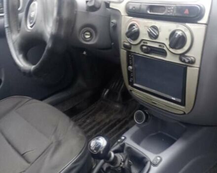 Серый Дэу Ланос, объемом двигателя 1.5 л и пробегом 283 тыс. км за 1400 $, фото 4 на Automoto.ua