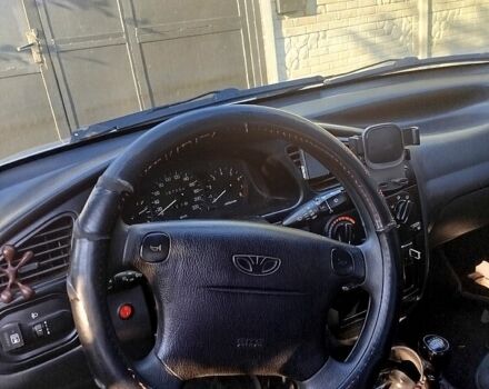 Серый Дэу Ланос, объемом двигателя 1.5 л и пробегом 260 тыс. км за 2400 $, фото 7 на Automoto.ua