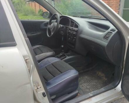 Сірий Деу Ланос, об'ємом двигуна 1.5 л та пробігом 455 тис. км за 2000 $, фото 11 на Automoto.ua