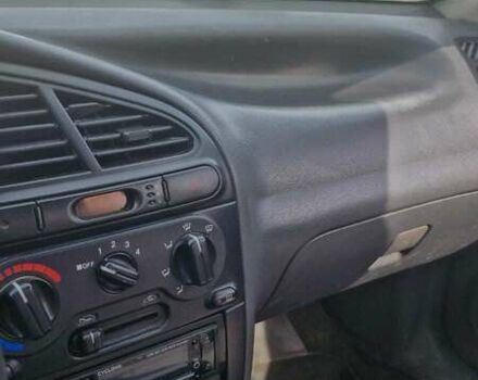 Серый Дэу Ланос, объемом двигателя 1.5 л и пробегом 220 тыс. км за 2200 $, фото 10 на Automoto.ua