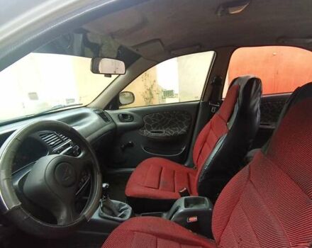 Серый Дэу Ланос, объемом двигателя 1.5 л и пробегом 196 тыс. км за 1000 $, фото 5 на Automoto.ua