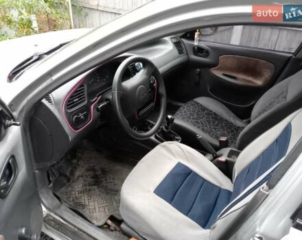 Серый Дэу Ланос, объемом двигателя 1.5 л и пробегом 381 тыс. км за 1500 $, фото 7 на Automoto.ua