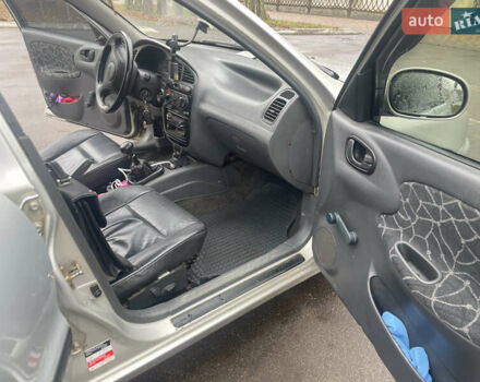 Серый Дэу Ланос, объемом двигателя 1.6 л и пробегом 320 тыс. км за 2599 $, фото 11 на Automoto.ua