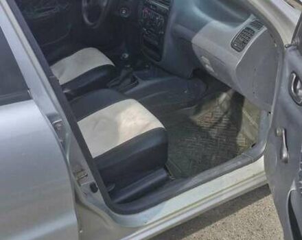 Серый Дэу Ланос, объемом двигателя 1.5 л и пробегом 220 тыс. км за 2200 $, фото 4 на Automoto.ua