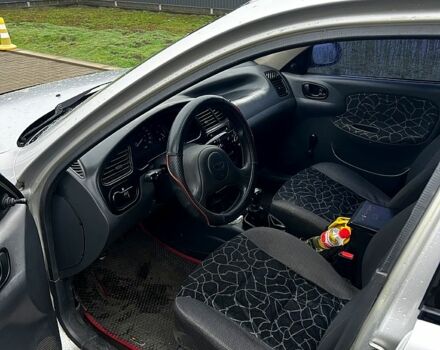 Серый Дэу Ланос, объемом двигателя 1.5 л и пробегом 300 тыс. км за 1300 $, фото 7 на Automoto.ua