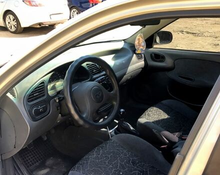 Серый Дэу Ланос, объемом двигателя 1.5 л и пробегом 210 тыс. км за 2600 $, фото 3 на Automoto.ua