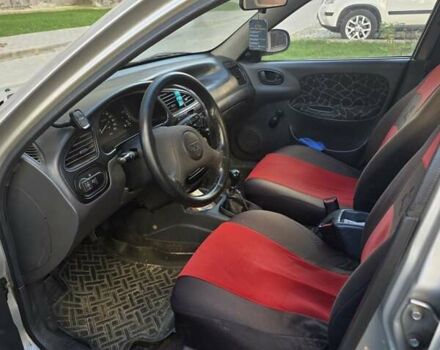 Серый Дэу Ланос, объемом двигателя 1.5 л и пробегом 278 тыс. км за 1600 $, фото 8 на Automoto.ua