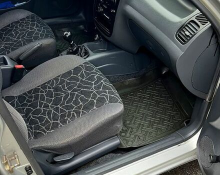 Серый Дэу Ланос, объемом двигателя 1.5 л и пробегом 286 тыс. км за 2000 $, фото 6 на Automoto.ua