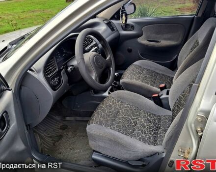 Серый Дэу Ланос, объемом двигателя 1.5 л и пробегом 225 тыс. км за 1999 $, фото 11 на Automoto.ua