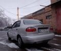 Серый Дэу Ланос, объемом двигателя 1.5 л и пробегом 184 тыс. км за 2000 $, фото 4 на Automoto.ua