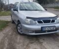 Сірий Деу Ланос, об'ємом двигуна 1.5 л та пробігом 235 тис. км за 1999 $, фото 1 на Automoto.ua