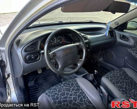 Серый Дэу Ланос, объемом двигателя 1.6 л и пробегом 250 тыс. км за 2199 $, фото 11 на Automoto.ua