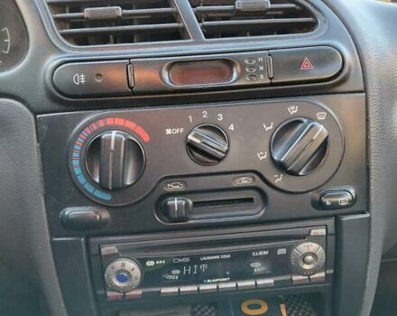 Сірий Деу Ланос, об'ємом двигуна 1.5 л та пробігом 286 тис. км за 1800 $, фото 7 на Automoto.ua