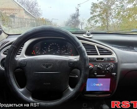 Серый Дэу Ланос, объемом двигателя 1.6 л и пробегом 224 тыс. км за 2000 $, фото 9 на Automoto.ua