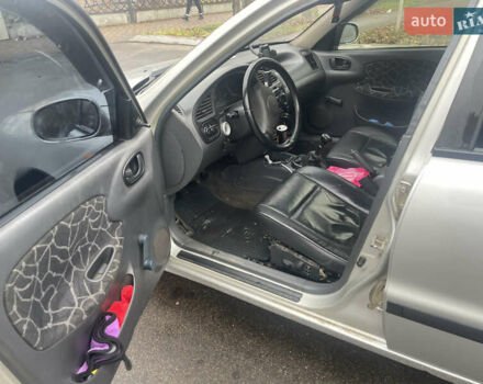 Серый Дэу Ланос, объемом двигателя 1.6 л и пробегом 320 тыс. км за 2599 $, фото 8 на Automoto.ua