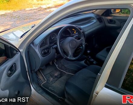 Серый Дэу Ланос, объемом двигателя 1.5 л и пробегом 306 тыс. км за 2300 $, фото 3 на Automoto.ua