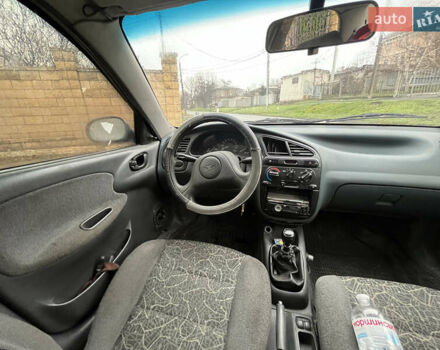 Сірий Деу Ланос, об'ємом двигуна 1.5 л та пробігом 200 тис. км за 1350 $, фото 4 на Automoto.ua