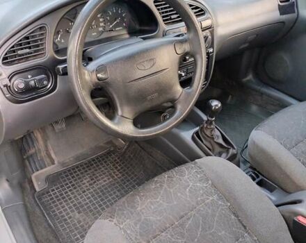 Сірий Деу Ланос, об'ємом двигуна 1.6 л та пробігом 231 тис. км за 2399 $, фото 7 на Automoto.ua