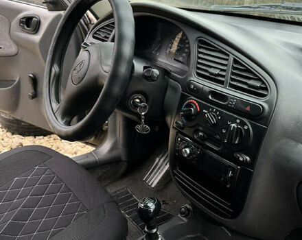 Сірий Деу Ланос, об'ємом двигуна 1.5 л та пробігом 210 тис. км за 2490 $, фото 24 на Automoto.ua