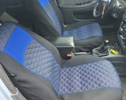 Серый Дэу Ланос, объемом двигателя 1.6 л и пробегом 268 тыс. км за 2000 $, фото 4 на Automoto.ua