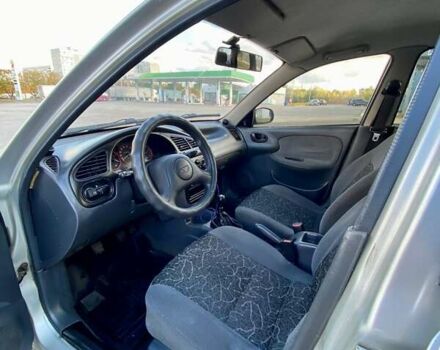 Серый Дэу Ланос, объемом двигателя 1.5 л и пробегом 243 тыс. км за 2600 $, фото 4 на Automoto.ua