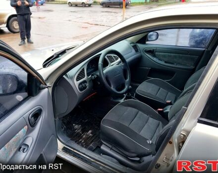 Серый Дэу Ланос, объемом двигателя 1.6 л и пробегом 140 тыс. км за 1500 $, фото 3 на Automoto.ua