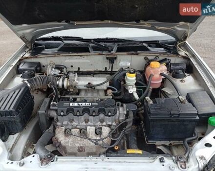 Сірий Деу Ланос, об'ємом двигуна 1.5 л та пробігом 172 тис. км за 1250 $, фото 6 на Automoto.ua