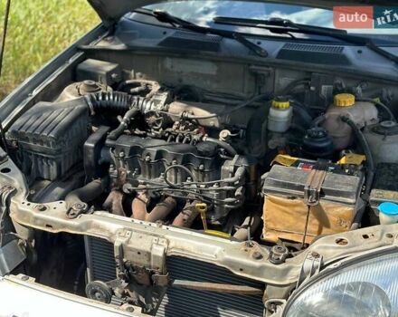 Серый Дэу Ланос, объемом двигателя 1.5 л и пробегом 458 тыс. км за 1700 $, фото 6 на Automoto.ua