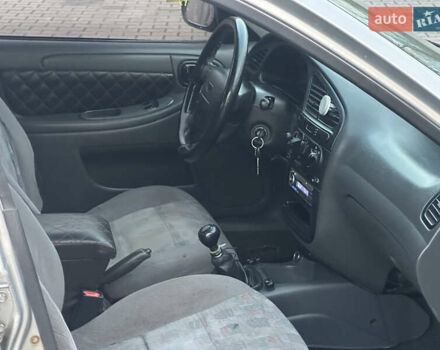 Сірий Деу Ланос, об'ємом двигуна 1.5 л та пробігом 168 тис. км за 1700 $, фото 58 на Automoto.ua