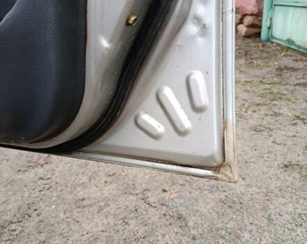 Сірий Деу Ланос, об'ємом двигуна 1.5 л та пробігом 257 тис. км за 1999 $, фото 2 на Automoto.ua