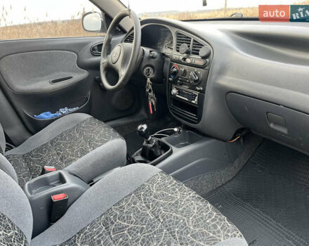 Сірий Деу Ланос, об'ємом двигуна 1.5 л та пробігом 110 тис. км за 1650 $, фото 26 на Automoto.ua