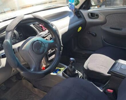 Сірий Деу Ланос, об'ємом двигуна 1.5 л та пробігом 168 тис. км за 2000 $, фото 10 на Automoto.ua