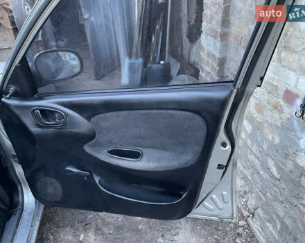 Серый Дэу Ланос, объемом двигателя 1.5 л и пробегом 220 тыс. км за 1200 $, фото 7 на Automoto.ua