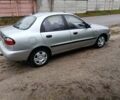 Сірий Деу Ланос, об'ємом двигуна 1.5 л та пробігом 257 тис. км за 1999 $, фото 1 на Automoto.ua