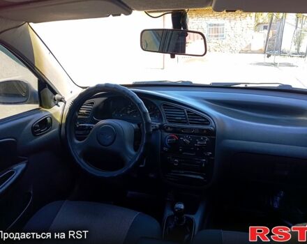 Серый Дэу Ланос, объемом двигателя 1.5 л и пробегом 220 тыс. км за 2700 $, фото 2 на Automoto.ua