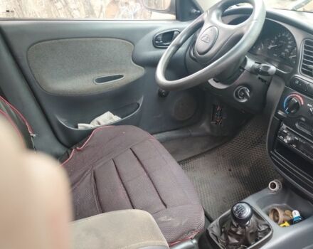 Сірий Деу Ланос, об'ємом двигуна 1.5 л та пробігом 237 тис. км за 1100 $, фото 7 на Automoto.ua