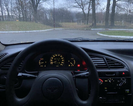 Сірий Деу Ланос, об'ємом двигуна 1.5 л та пробігом 230 тис. км за 1550 $, фото 5 на Automoto.ua