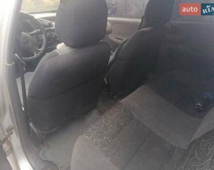 Серый Дэу Ланос, объемом двигателя 1.5 л и пробегом 317 тыс. км за 1950 $, фото 8 на Automoto.ua