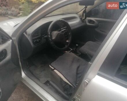 Серый Дэу Ланос, объемом двигателя 1.5 л и пробегом 317 тыс. км за 1950 $, фото 6 на Automoto.ua