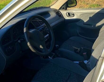 Серый Дэу Ланос, объемом двигателя 1.5 л и пробегом 270 тыс. км за 2400 $, фото 5 на Automoto.ua